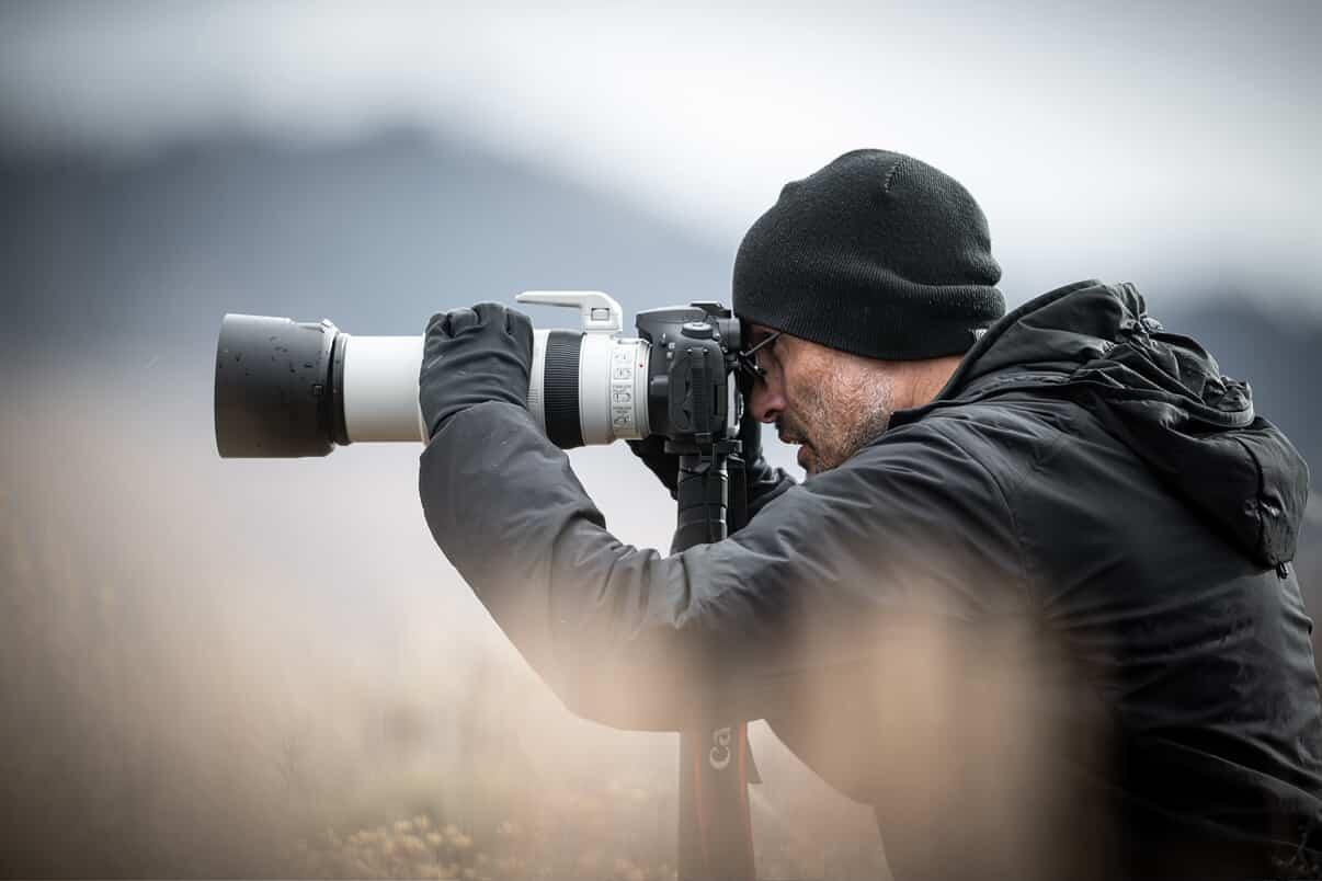 Packy Savvenas photographing wildlife in the field
