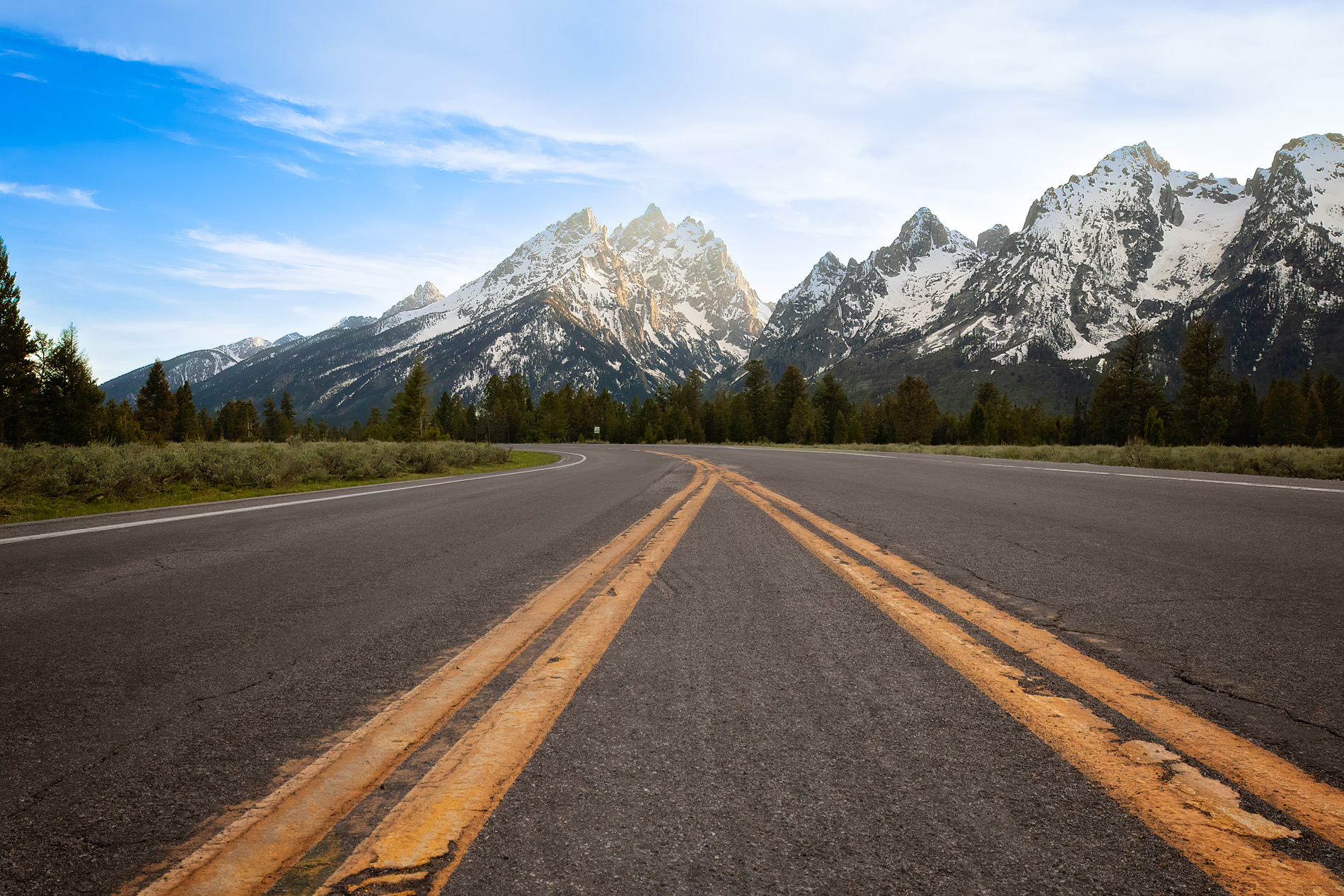 Grand Teton road leading toward the mountains